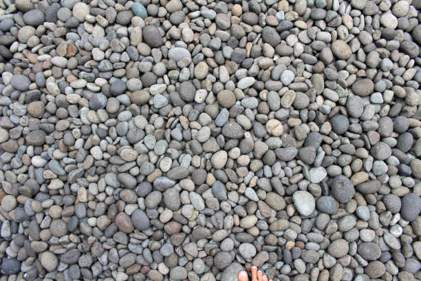 Big stones among smaller pebbles, in the garden. Meditative