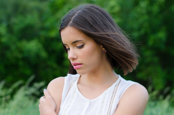 istock Young woman in the summer nature 1124719247