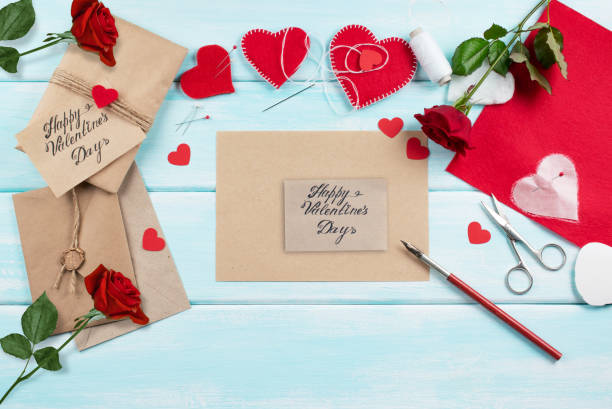 istock Workspace with tools for handmade and sewing felt hearts for Valentine's Day. Master class. 1124719698