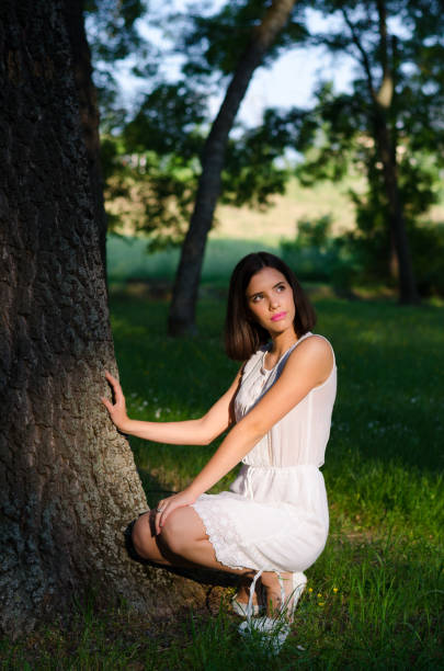 istock Young woman in the summer nature 1124719906