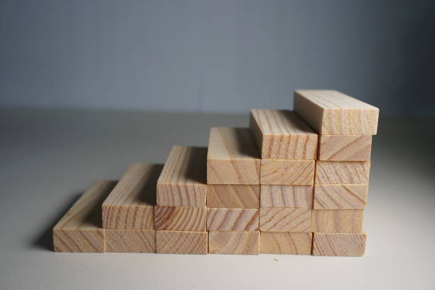 istock Wooden blocks, used for Jenga game or dominoes. 1124721704