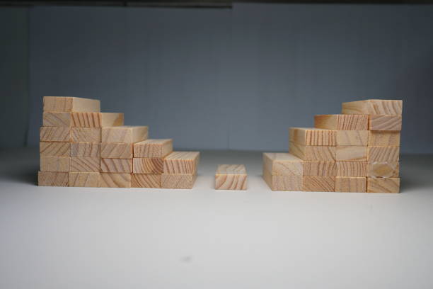 istock Wooden blocks, used for Jenga game or dominoes. 1124721927