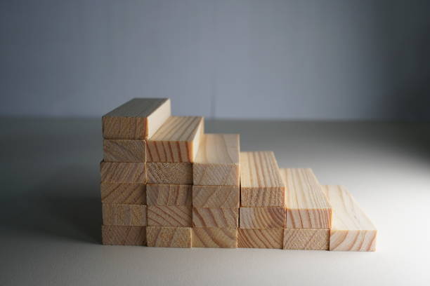 istock Wooden blocks, used for Jenga game or dominoes. 1124721929