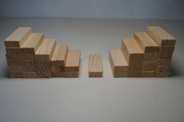istock Wooden blocks, used for Jenga game or dominoes. 1124722113