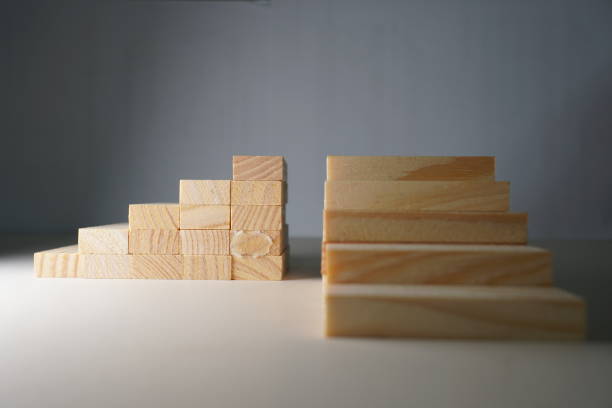 istock Wooden blocks, used for Jenga game or dominoes. 1124724127