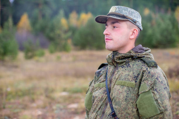 istock a portrait of a brave soldier standing 1124724244