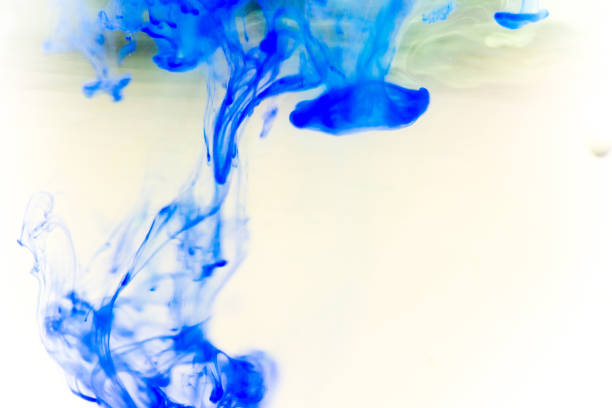 istock a drop of paint pouring in water 1124731173