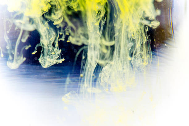 istock a drop of paint pouring in water 1124731344