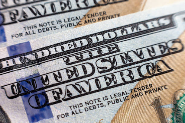 istock Close-up view on one hundred dollar bill. Macro view on one hundred dollar banknote 1124735560
