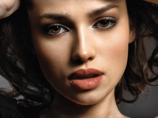 istock Beautiful brunette woman with  brown eyes. 1124735911