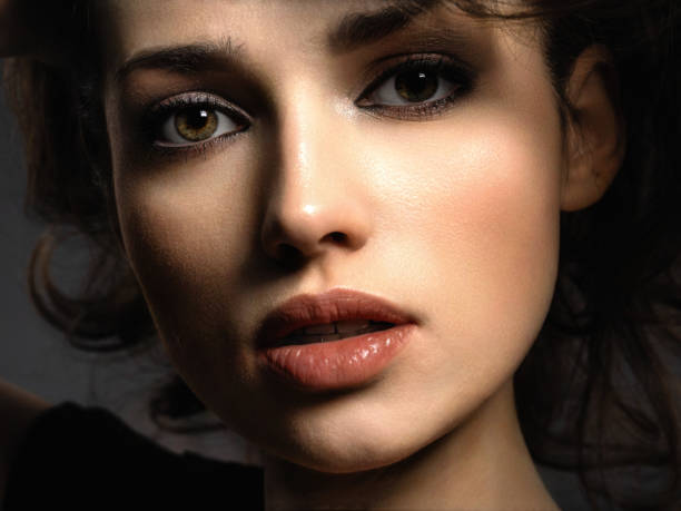 istock Beautiful brunette woman with  brown eyes. 1124735933
