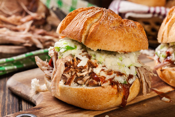 istock Homemade pulled pork burger with coleslaw salad 1124741980