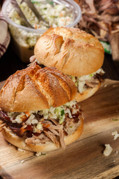 istock Homemade pulled pork burger with coleslaw salad 1124742191