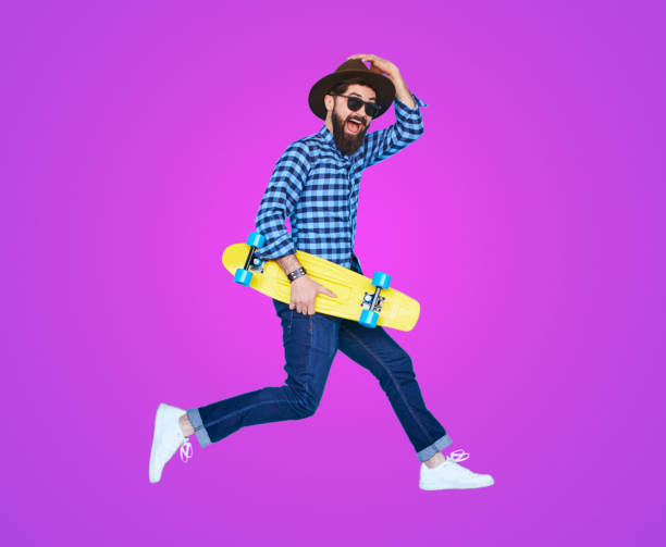 istock Hipster with beard in motion on purple background 1124742819