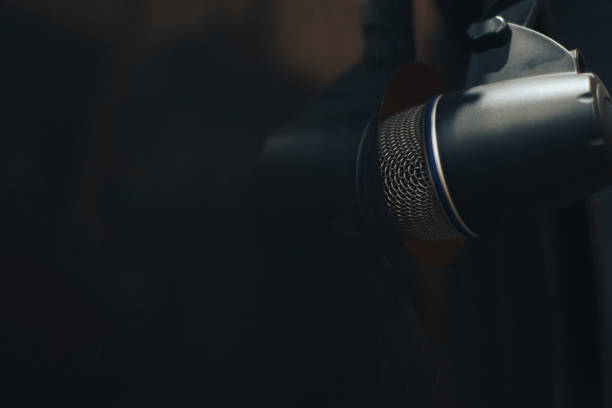 istock Microphone and drums in concert stage. 1124743095