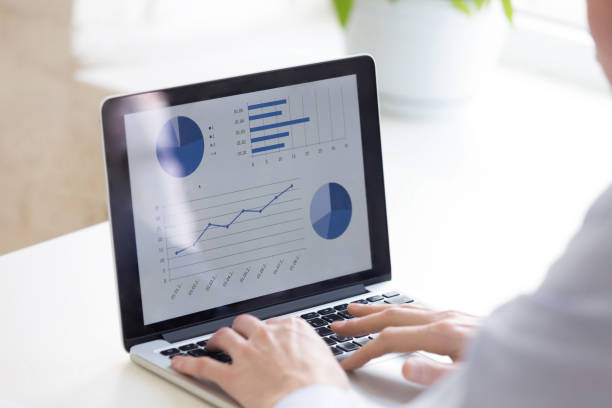istock Close up businessman using laptop, analyze business statistics 1124743131