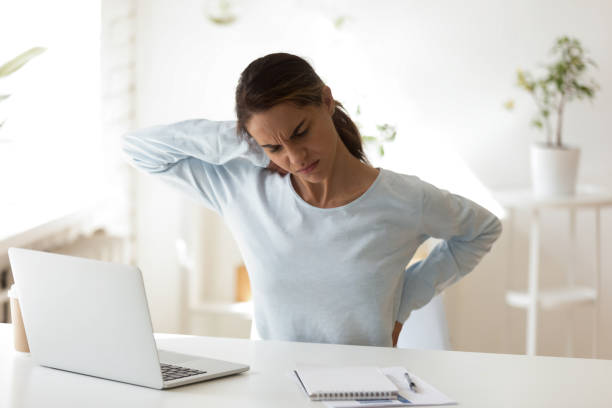 istock Stressed woman having health problem, feeling back pain 1124743264