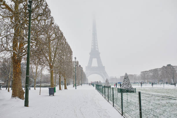 istock Scenic view to the Eiffel tower on a day with heavy snow 1124747084