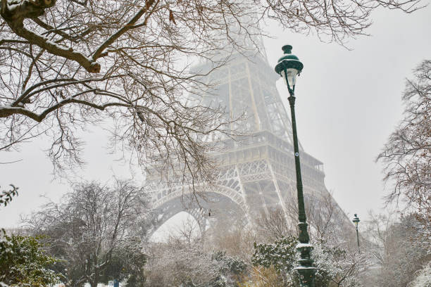 istock Scenic view to the Eiffel tower on a day with heavy snow 1124747155