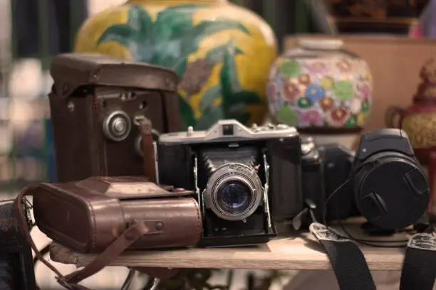 Photo of antique camera, flea market, old camera, camera bag