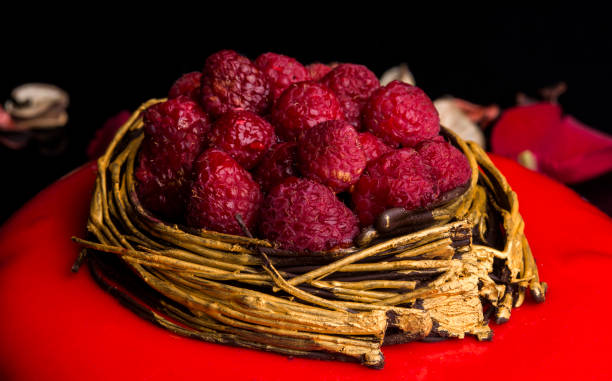 istock Beautiful red decorative cake with raspberries 1124747339