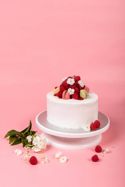 Raspberry cake with white buttercream Raspberry cake with white buttercream palmin photos stock pictures, royalty-free photos & images