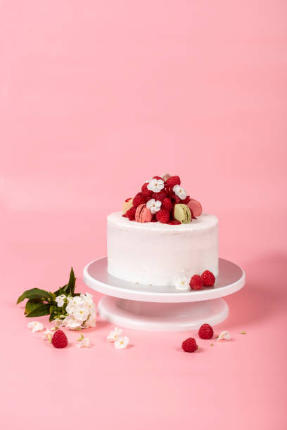 Raspberry cake with white buttercream Raspberry cake with white buttercream palmin photos stock pictures, royalty-free photos & images