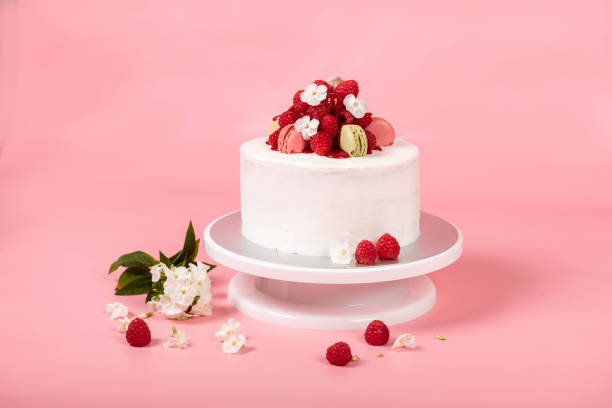 Raspberry cake with white buttercream Raspberry cake with white buttercream palmin photos stock pictures, royalty-free photos & images