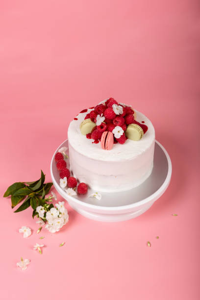 Raspberry cake with white buttercream Raspberry cake with white buttercream palmin photos stock pictures, royalty-free photos & images