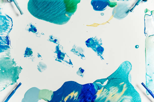 istock strokes and blots of paint on white background 1124753114