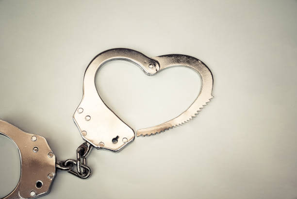 istock Handcuffs in a love heart 1124754307