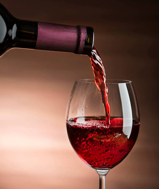 istock Wine pouring in to glass 1124754337