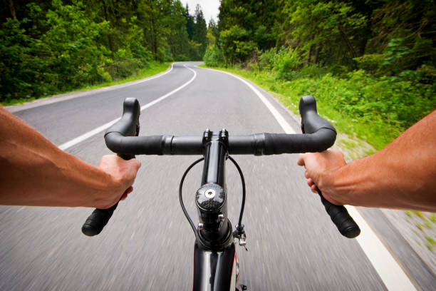 езда на велосипеде по дороге - motorcycle handlebar road riding стоковые фото и изображения