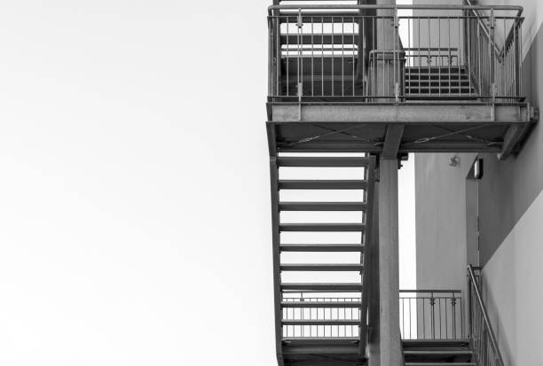 istock Low Angle View Of Fire Escape On Building Against Clear Sky 1124756875
