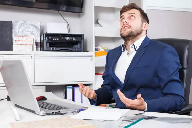 Photo of Worried salesman