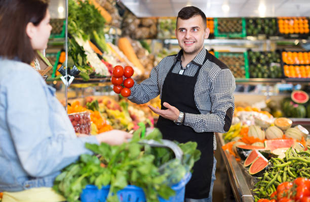 istock Male seller assisting in buying 1124767612