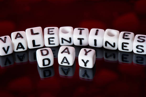 istock Word valentines day from cubes on a dark background. 1124771397
