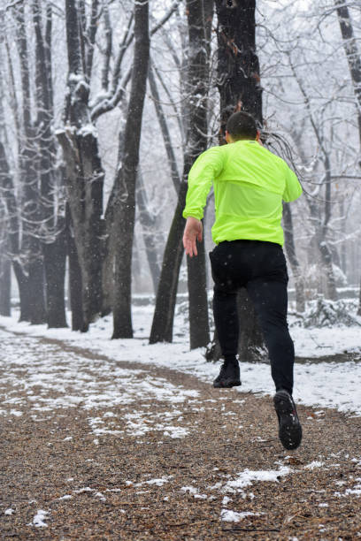 istock A young male runner runs in the park 1124772193