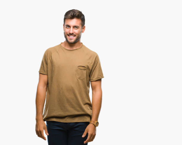 istock Young handsome man over isolated background looking away to side with smile on face, natural expression. Laughing confident. 1124773786