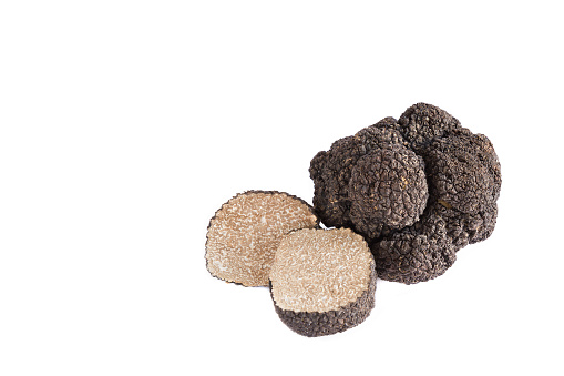 Black truffles isolated on a white background.space for your text