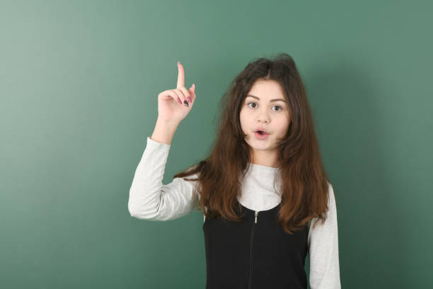 istock Smiling little schoolgirl 1124779196