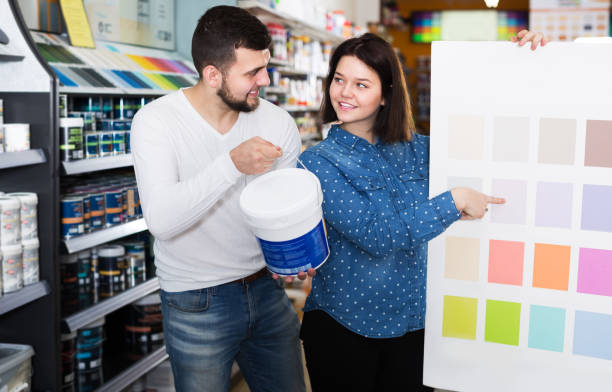 istock Couple in paint supplies store 1124782434