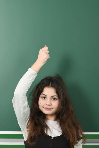 istock Smiling little schoolgirl 1124782687