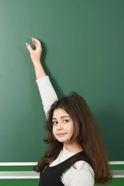 istock Smiling little schoolgirl 1124782807