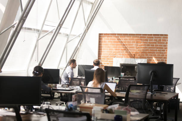istock Business people working in coworking open space 1124783328