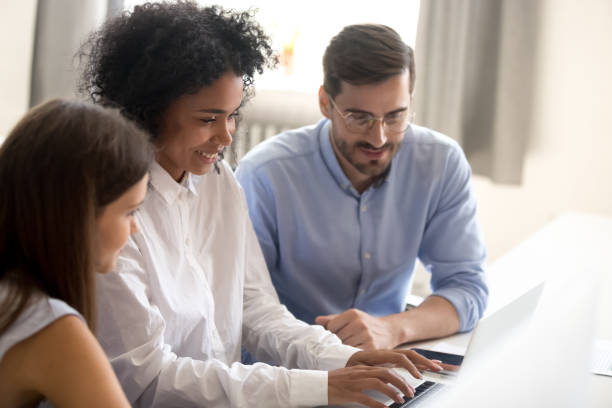 istock Diverse multiracial colleagues working together in office 1124783335