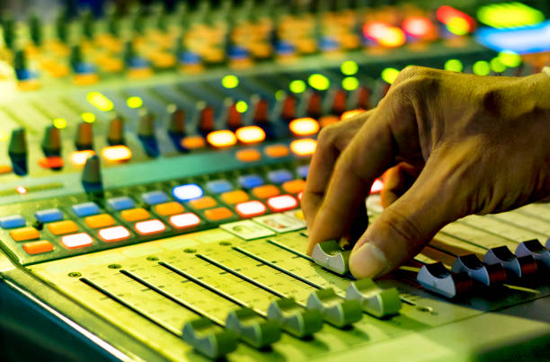 istock DJ mixing music on console at the night club 1124784788