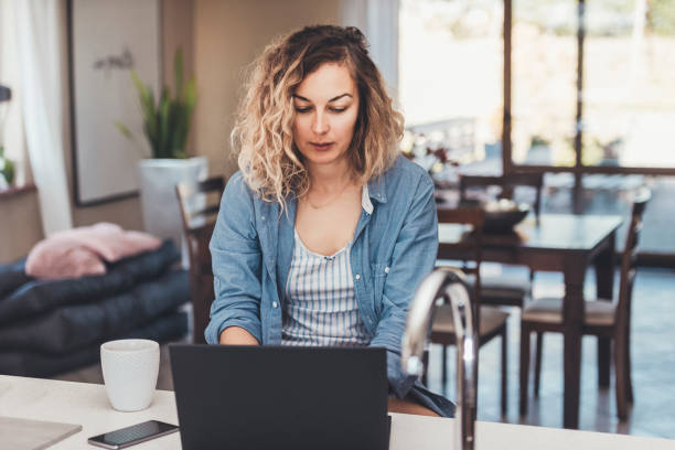 istock Woman working on a laptop 1124787440