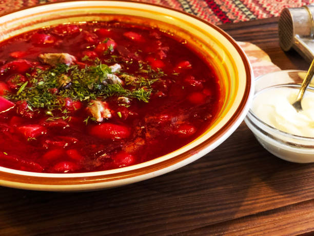 istock Traditional Ukrainian borsch with bacon. Beautiful serving dishes 1124797592