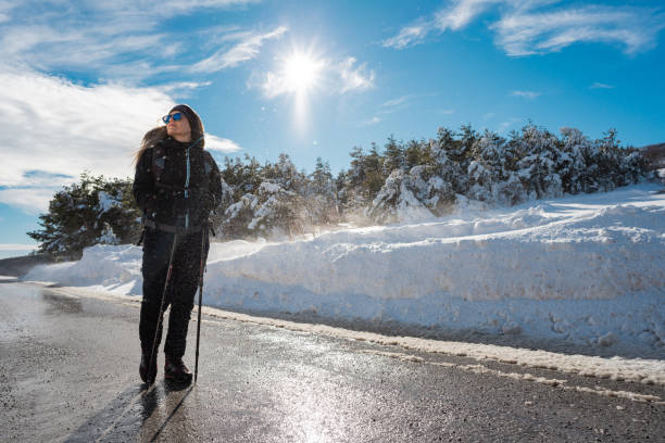 istock Woman hiker rests from trekking 1124799049